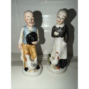 Vintage Set of 2 Bisque Porcelain Old Man Old Woman Farmer Wife Tending  Chicken